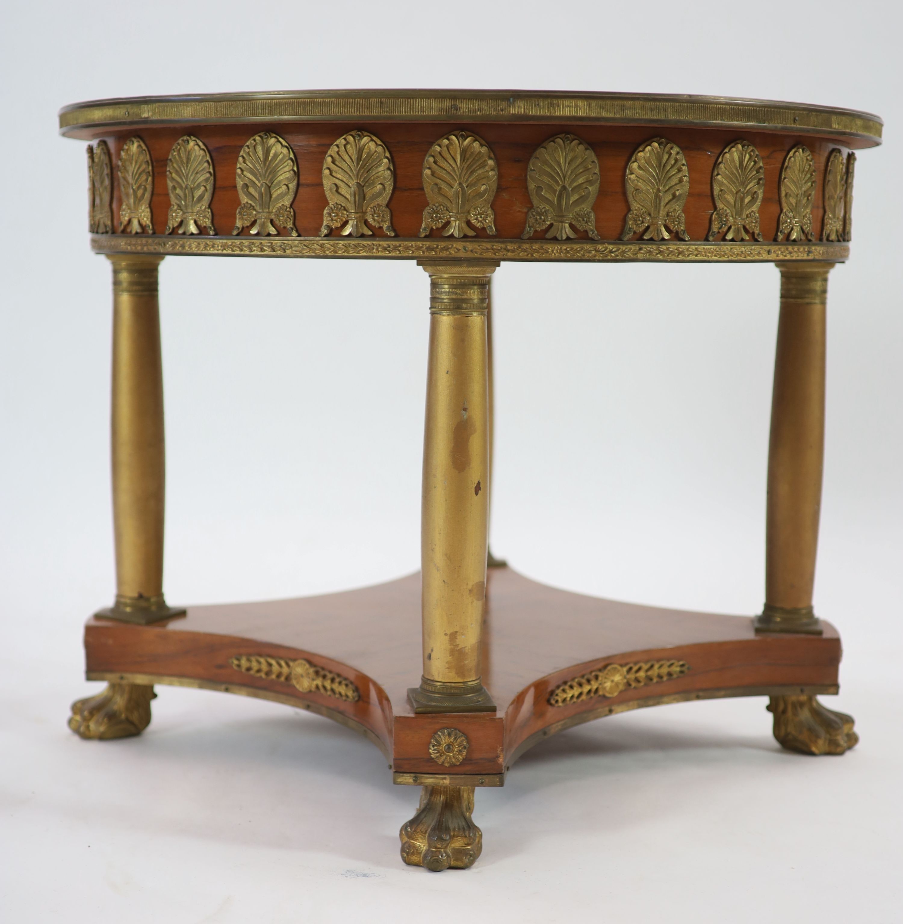 A French empire style ormolu mounted marquetry centre table Diam.81cm H.65cm